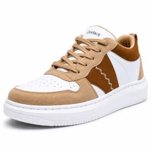 Three-quarter angle view of Zodack low-top sneaker in white perforated leather, tan and brown suede overlays with zigzag embroidery, and a white cupsole