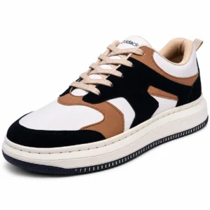 Three-quarter angle view of Zodack low-top casual sneaker in white leather with black suede toe overlay, tan accents, and an off-white platform cupsole