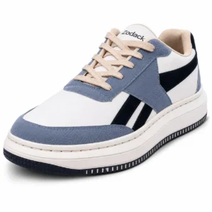 Three-quarter angle view of Zodack low-top sneaker featuring white leather, geometric-textured slate blue overlays, black stripes, and beige laces